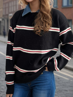 Black knit crewneck pullover sweater with red and white nautical stripes.