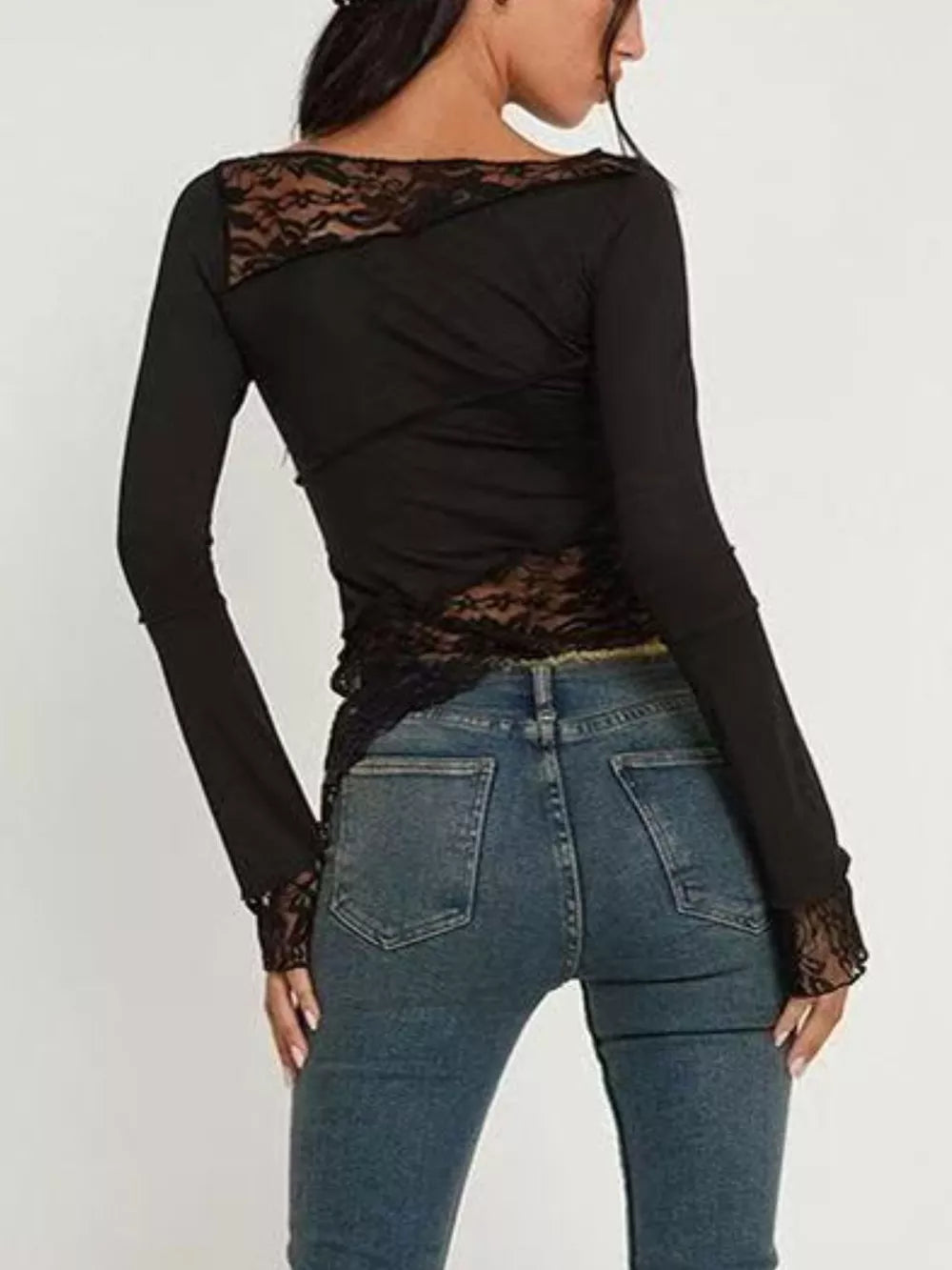 Black asymmetrical long sleeve tee with lace details on shoulders and cuffs.