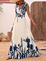 Botanical print maxi dress with square neck, cap sleeves, and elastic waist.