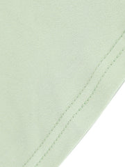 Light green ruffled mermaid maxi dress detail showing fabric texture and double stitching.