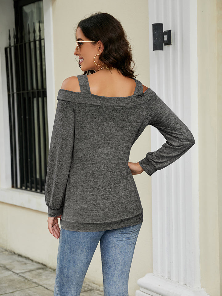 Charcoal cutout shoulder square neck blouse with long sleeves.