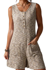 Textured button front romper in a speckled beige and brown knit with patch pockets.