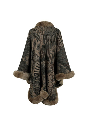 Camel feather print cape with faux fur trim and pom-poms.