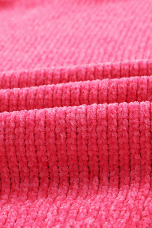 Plush pocket cardigan in hot pink with a deep V-neck and ribbed texture.