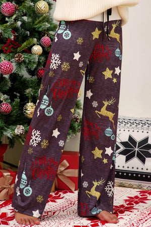 Festive print wide-leg lounge trousers in dusty purple with Christmas motifs like reindeer, snowflakes, and ornaments.