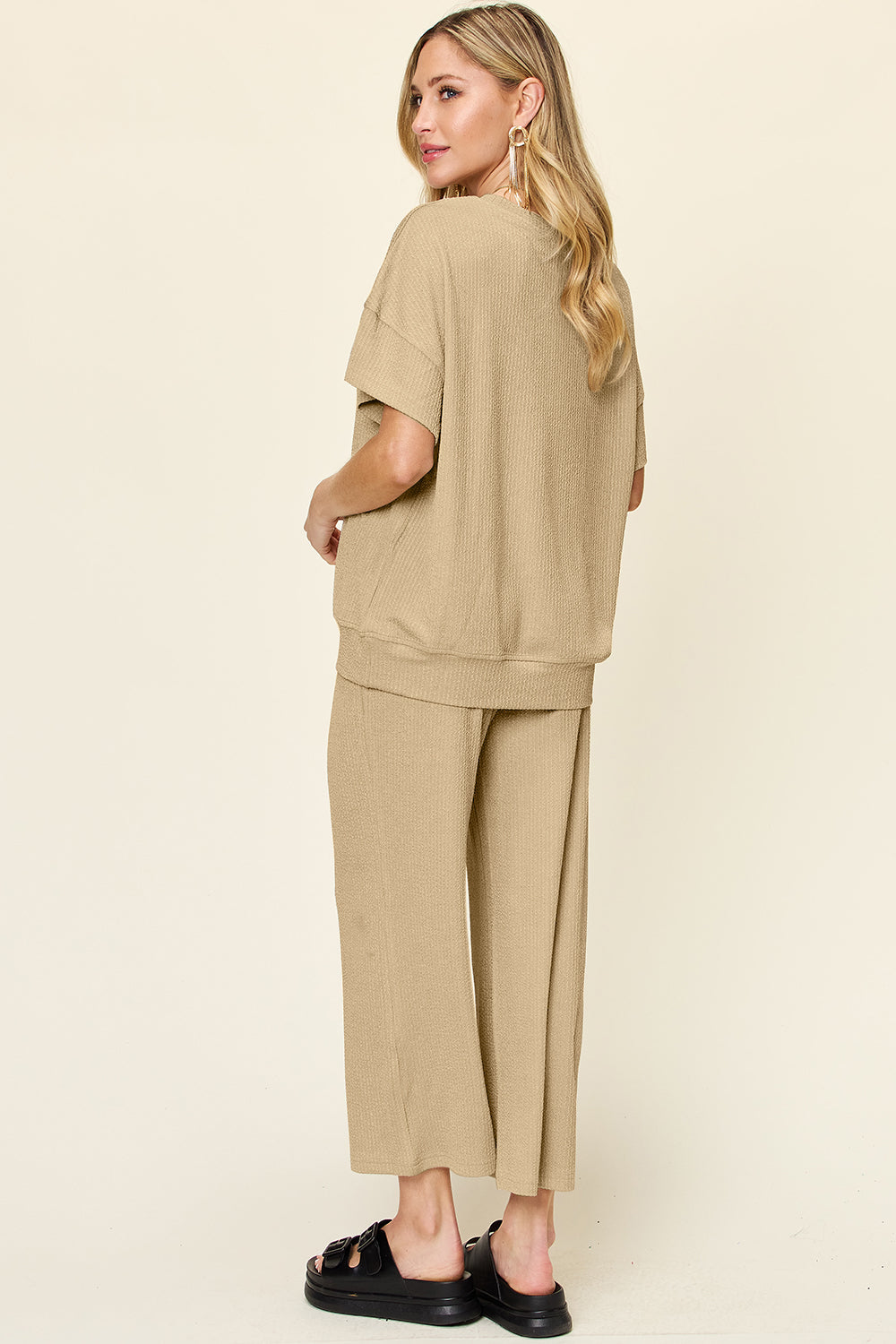 Khaki waffle knit lounge set with short sleeves and wide leg pants.