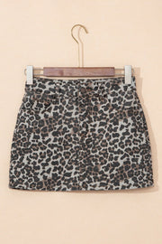 Denim mini skirt in leopard print with button and zip closure.