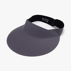 Sculptural visor sun shield in dark gray with adjustable black band.