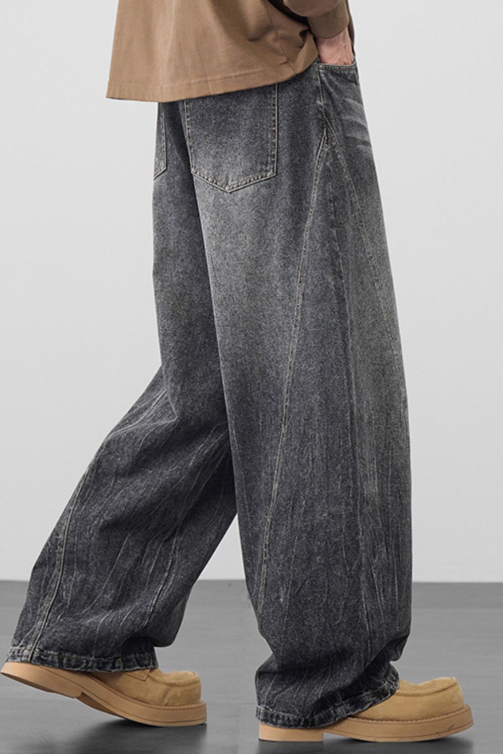 Men's dark gray 100% cotton wide-leg jeans with a relaxed fit.