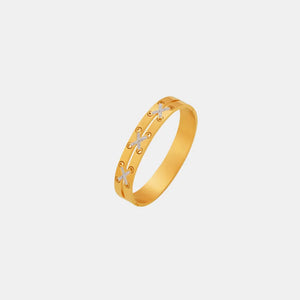 Gold cuff bracelet with diamond laced crisscross detail
