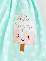 Baby dress in mint green with white polka dots and a cute ice cream applique.