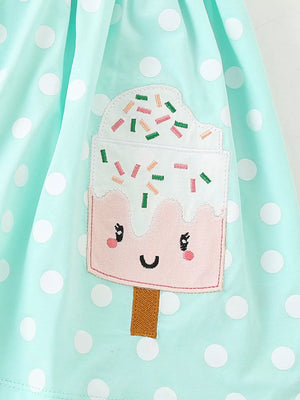 Baby dress in mint green with white polka dots and a cute ice cream applique.