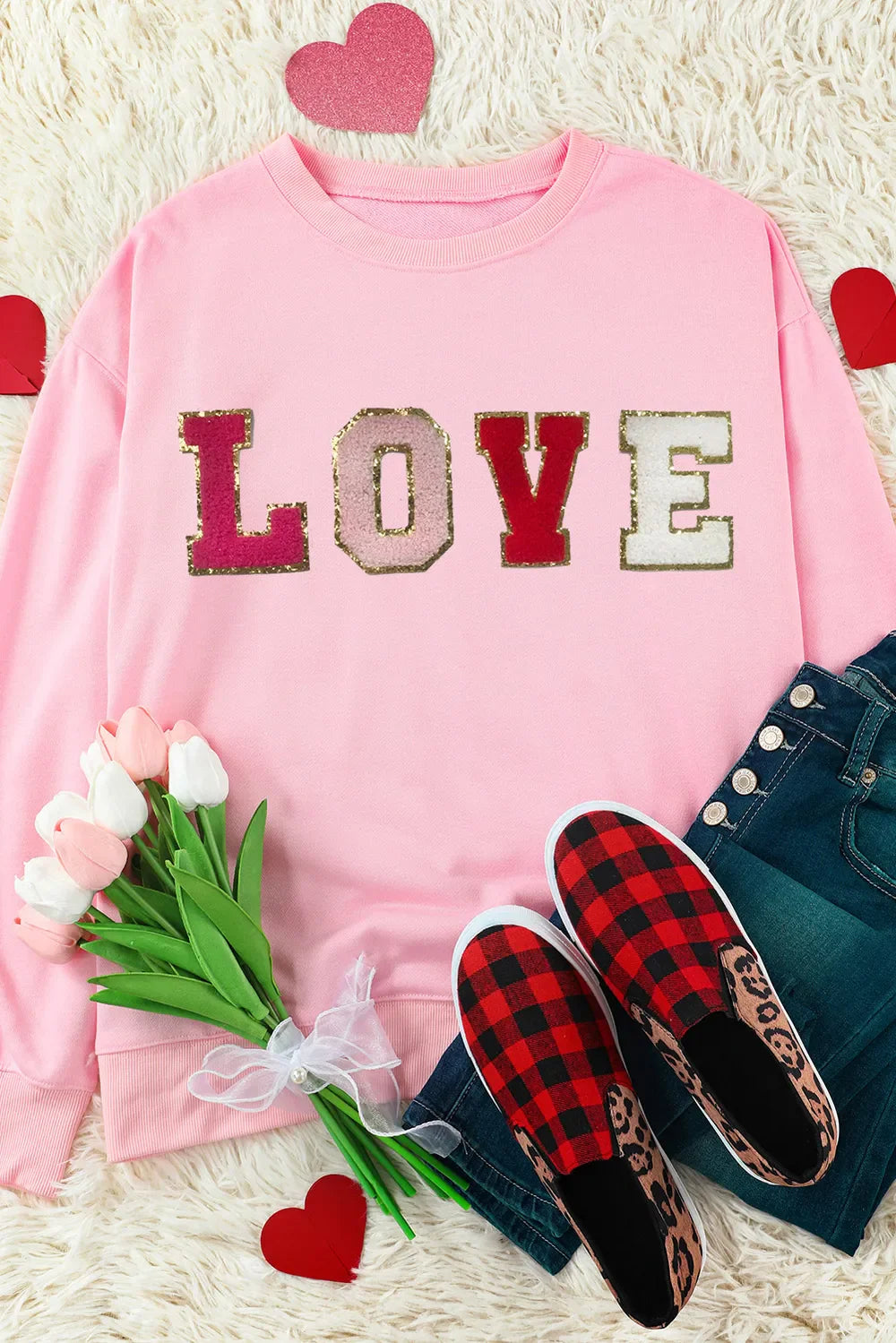 Blush pink sweatshirt with embellished LOVE letters, crewneck, long sleeves.