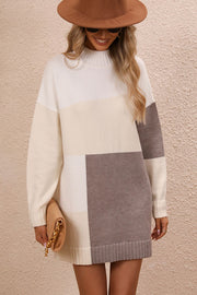 Geometric colorblock knit mini dress in ivory, camel, and grey with a mock neck and long sleeves.