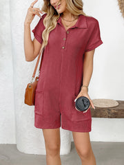 Scarlet ribbed knit romper with patch pockets, collared neckline and button front.