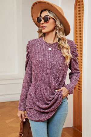 Textured drape sleeve top in dusty rose with ruched shoulder detail and crossover front.