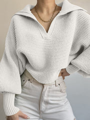 White wide collar knit sweater with balloon sleeves and a v-neck.