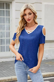 Royal blue sequin cold shoulder top with crisscross neckline detail and white trim