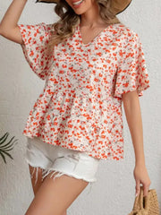 Vibrant floral peplum blouse with ruffle sleeves and v-neck