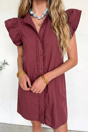 Burgundy denim button-down mini dress with ruffled trim and flutter sleeves.