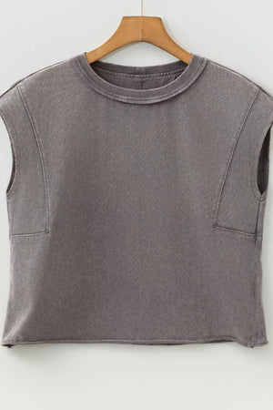 Relaxed mineral wash cotton tank top with crewneck and raw hem.