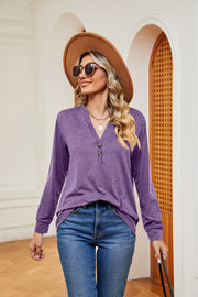 Henley-inspired long sleeve top in heathered purple with a V-neck and button detail