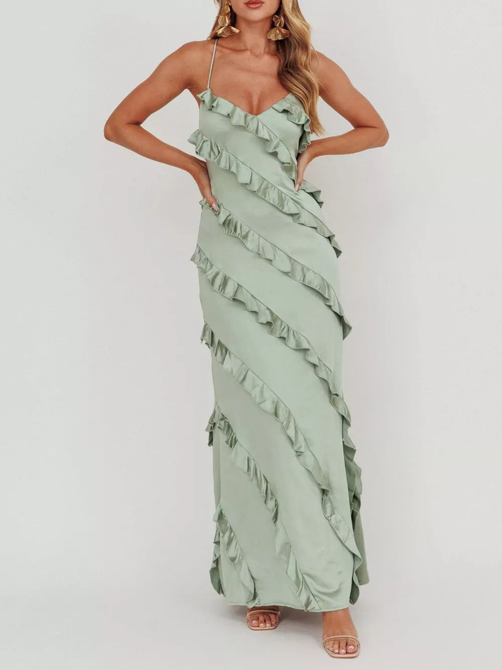 Sage ruffled spaghetti strap maxi dress with diagonal ruffle detailing.