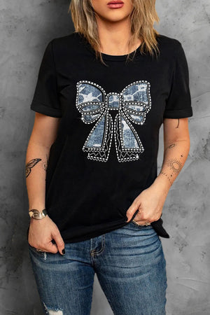 Black tee with a denim bow embellished with rhinestones and sequins.