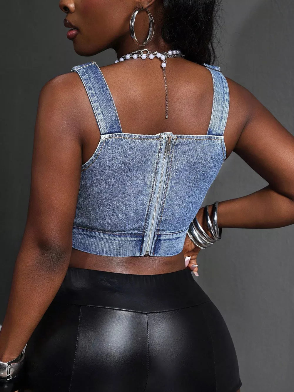 Denim crop top with adjustable straps and back zipper detail