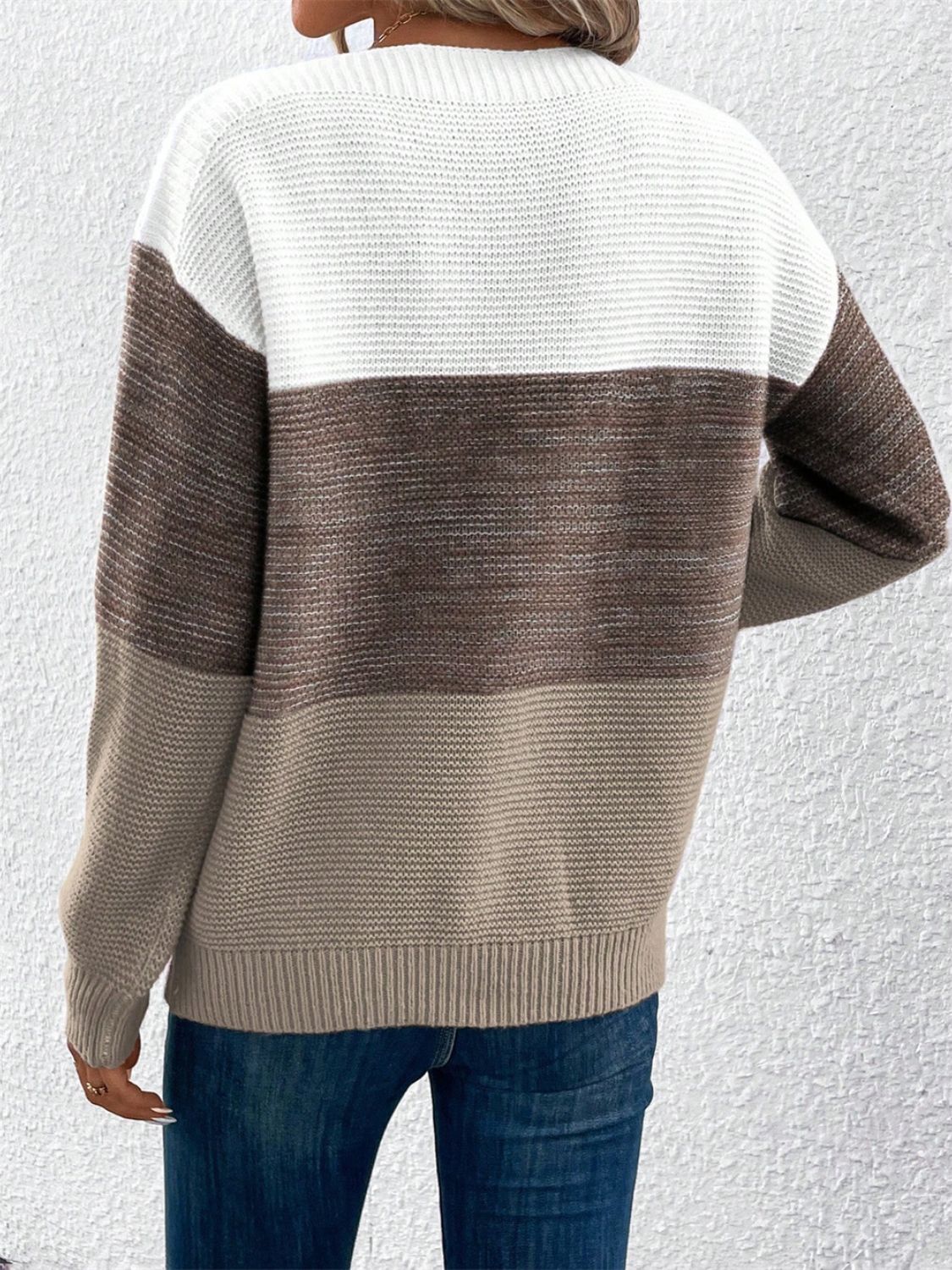 Colorblock boatneck knit sweater in white, brown, and taupe acrylic.