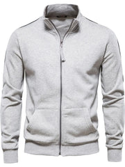 Gray track jacket with zip-up front, stand collar, and black side stripes.