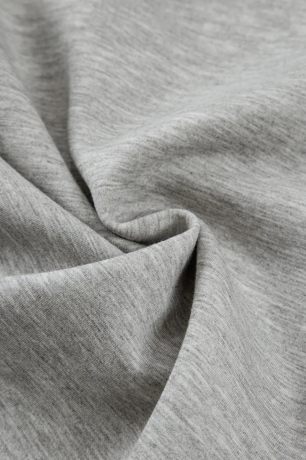Gray heather knit fabric detail of wide-leg lounge trousers