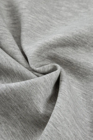 Gray heather knit fabric detail of wide-leg lounge trousers