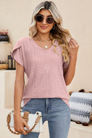 Blush pink eyelet v-neck top with short flutter sleeves and a breathable casual fit.