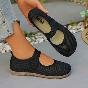 Round Toe Slip-ons in White, model styling view