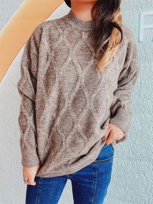 Sparkle knit relaxed fit sweater in beige with diamond pattern, crew neck, and long sleeves.