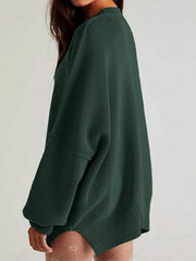 Oversized ribbed knit sweater in Black Forest with drop shoulders and relaxed fit.