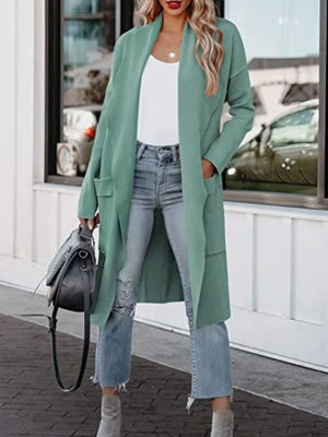 Relaxed-fit open-front duster cardigan in a muted green with pockets and long sleeves.
