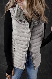 Gray quilted puffer vest with plush fleece collar and zipper closure