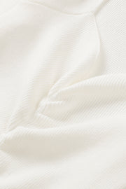 Ivory ribbed knit top with ruched front detail