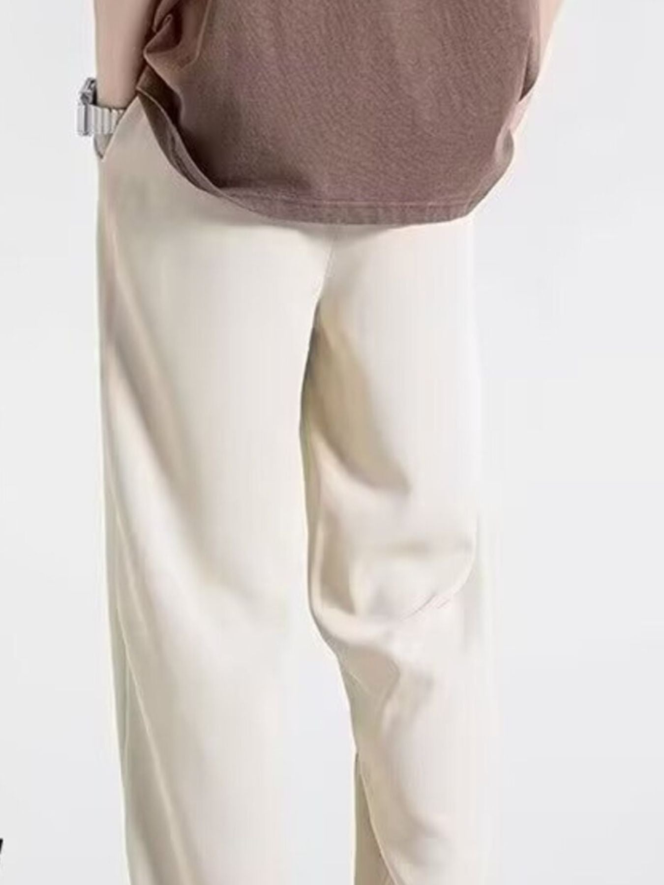 Men's off-white relaxed fit drawstring sweatpants with a casual, comfortable look.