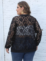 Black lace bomber jacket with ribbed trim and sheer floral pattern.