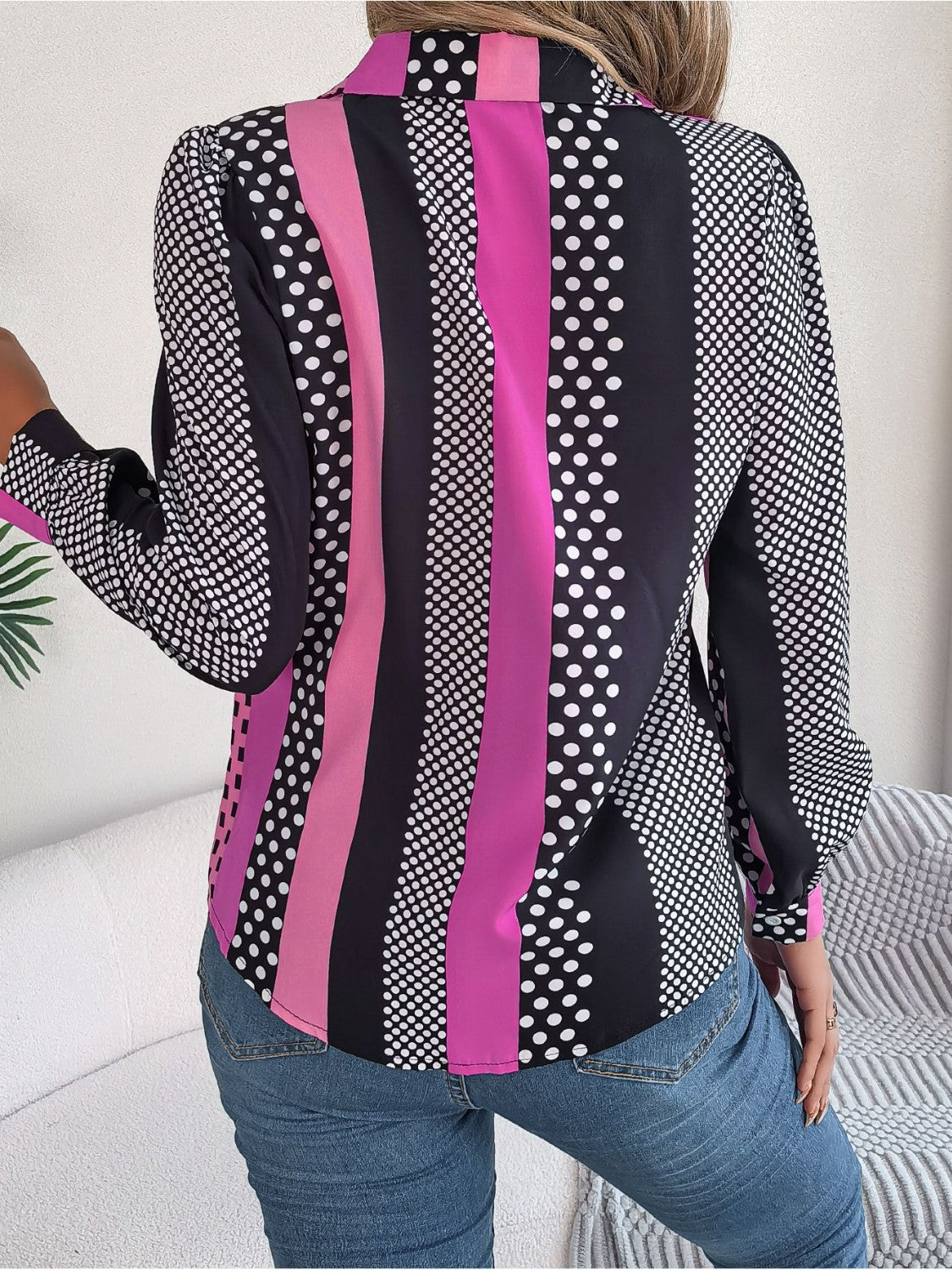 Panelled print collared blouse with black, pink, and white polka dot and stripe patterns.