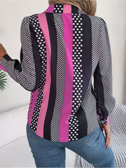 Panelled print collared blouse with black, pink, and white polka dot and stripe patterns.