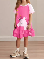 Pink unicorn dress with ruffled hem and stars, short sleeves, cotton.