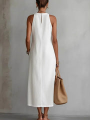 White sleeveless midi dress with pockets, cotton, halter neck, back view