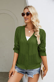 Green openwork knit button-down cardigan with a V-neck and long sleeves.