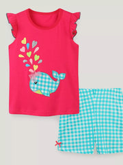 Toddler girls' pink whale print pajama set with ruffled cap sleeves and blue gingham shorts.
