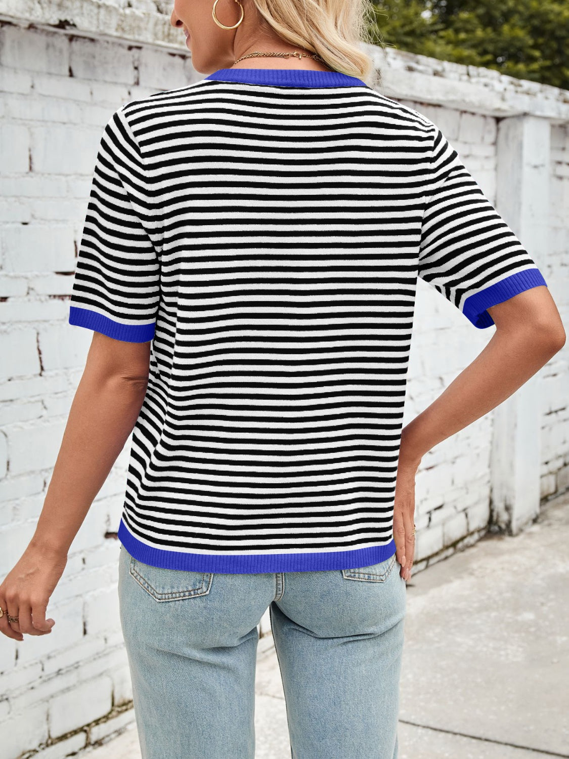 Nautical striped knit tee with blue trim and short sleeves.
