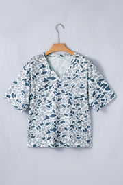 Camo print V-neck t-shirt with elbow sleeves and a chest pocket.